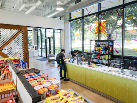 Student paying at the Grab & Goat