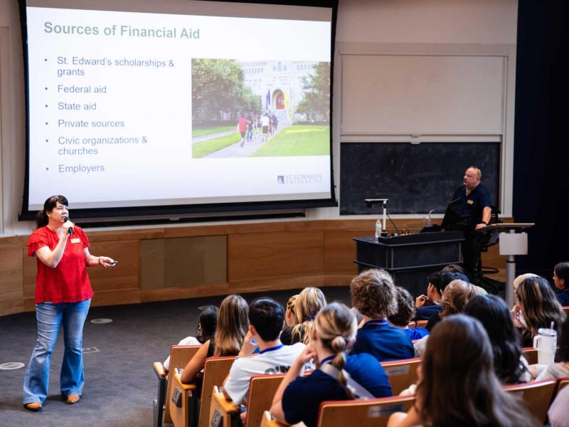 Senior Director of Student Financial Aid speaking to students on how to pay for college.