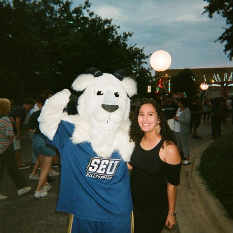 Topper and Nina Rocha stand together outside at Hillfest