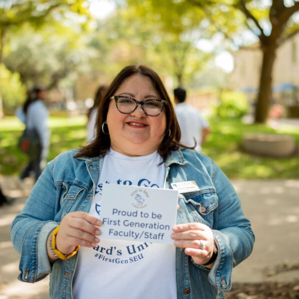 Student holding sign 