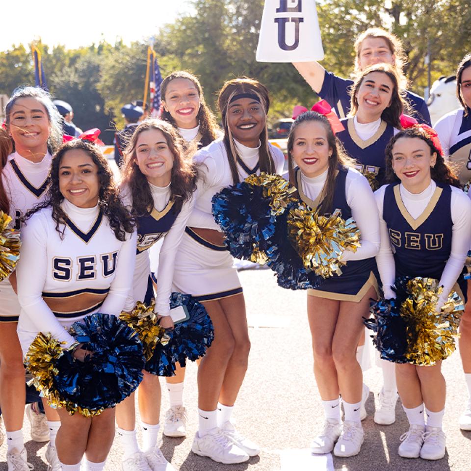 The St. Edward's University cheer team at the 2022 Homecoming parade