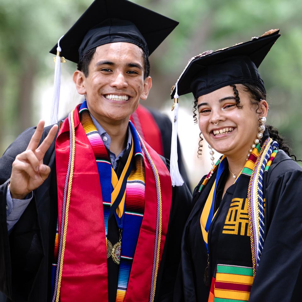 Graduating seniors pose for a group photo at commencement.