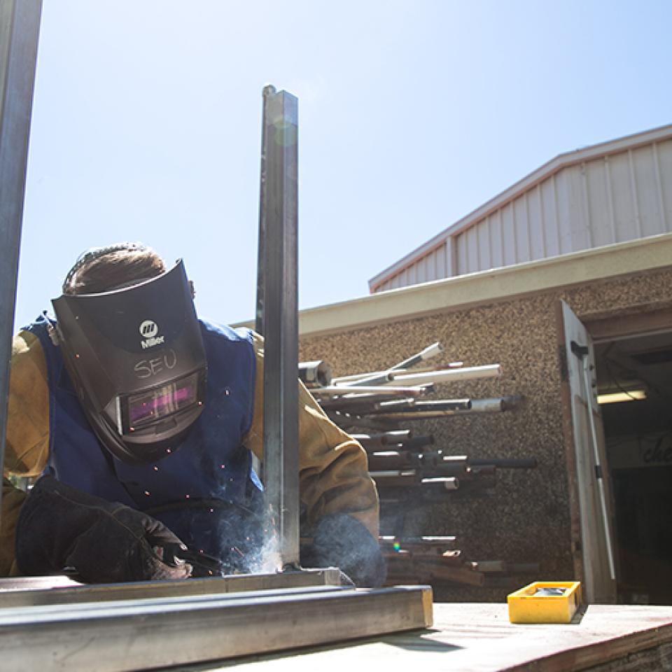 Jacob working on items used during the production