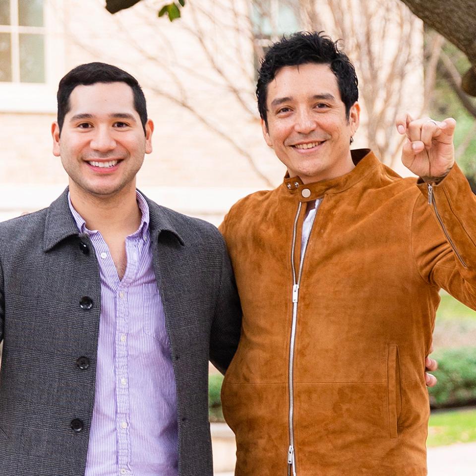 Gabriel Luna posing with a St. Ed's staff member