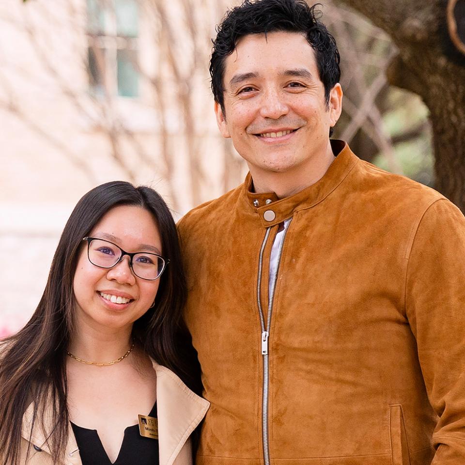 Gabriel Luna posing with a St. Ed's staff member