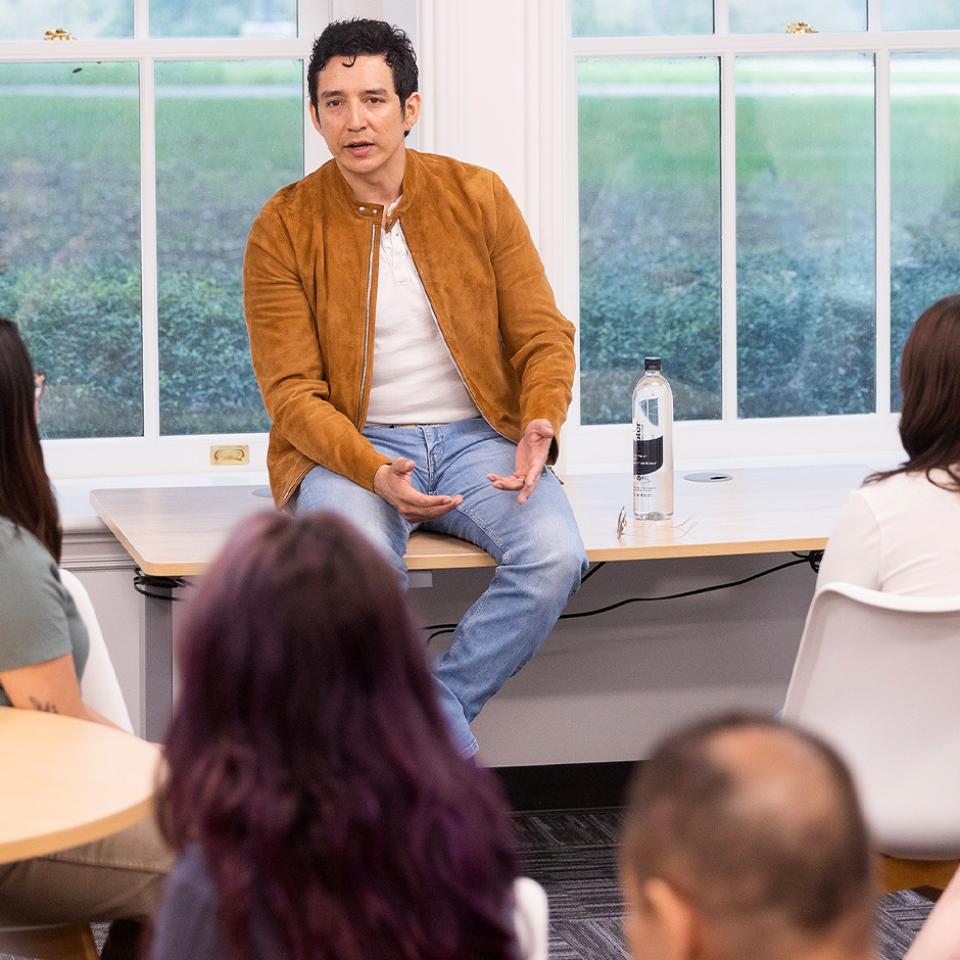 Gabriel Luna speaks to students during a meet-and-greet