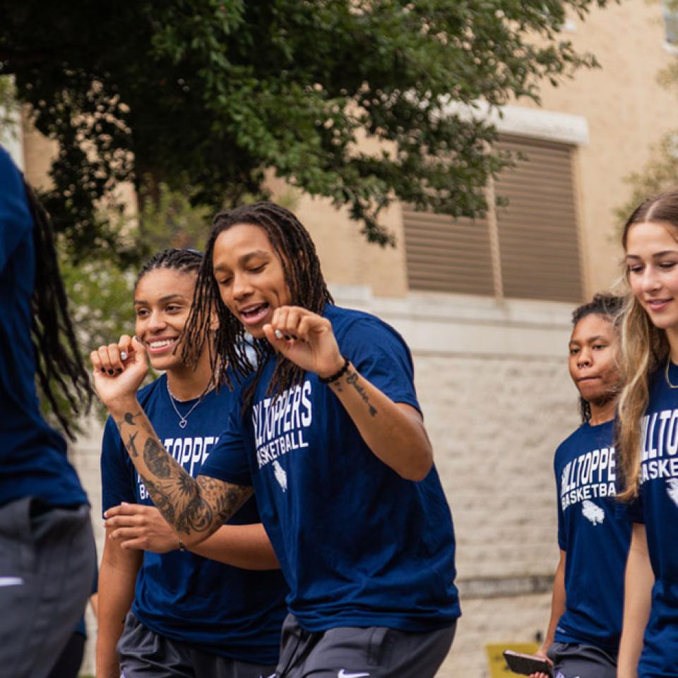 Women's basketball walk the parade