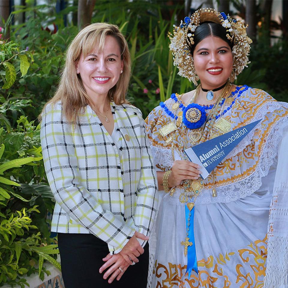 President Fuentes posing for a photo with a Panamanian Folklore Dancer