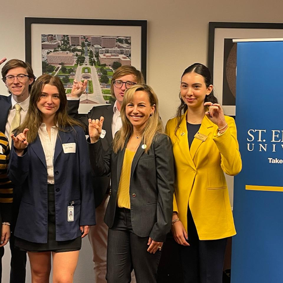 President Fuentes and students celebrate St. Edward's University Day at the Texas State Capitol