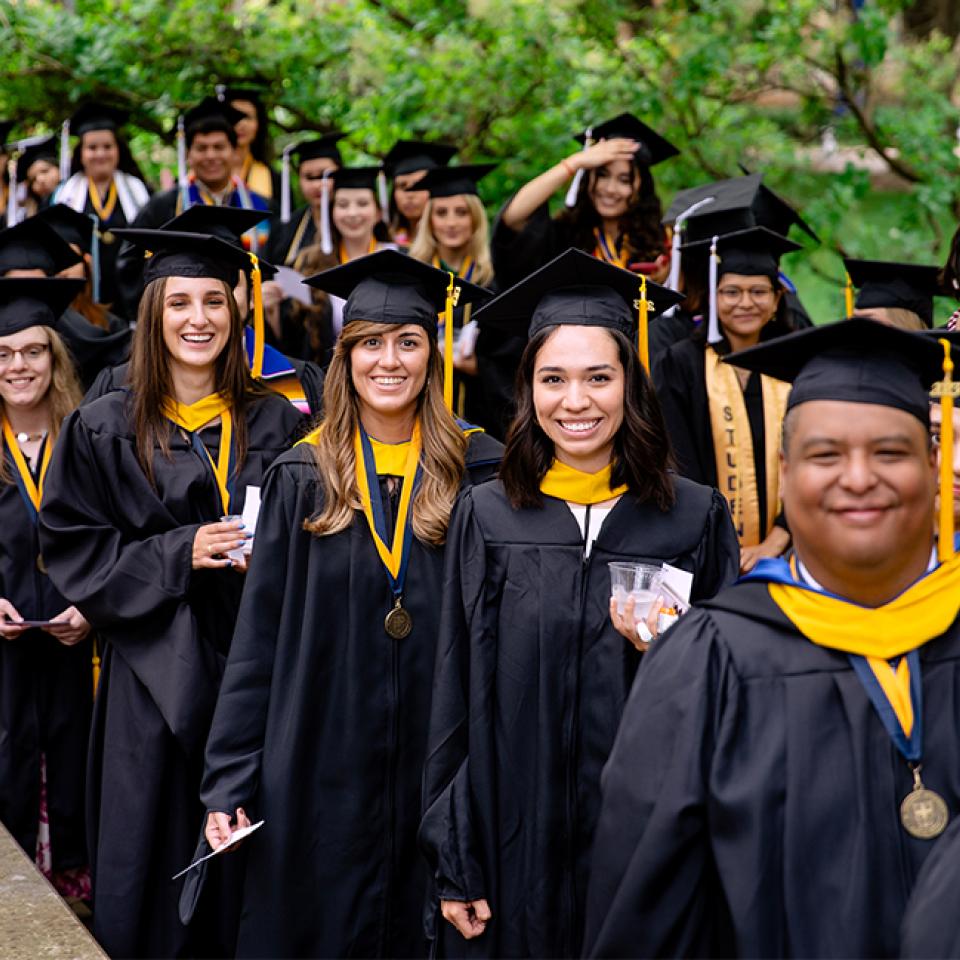 Spring Commencement 2023 graduates posing for a picture together