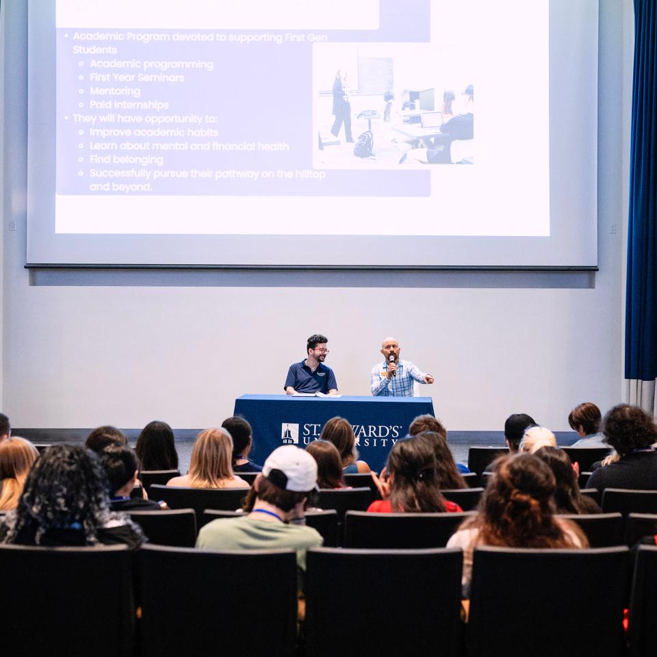 A group of people listening to a two person speaker panel in Jones Auditorium