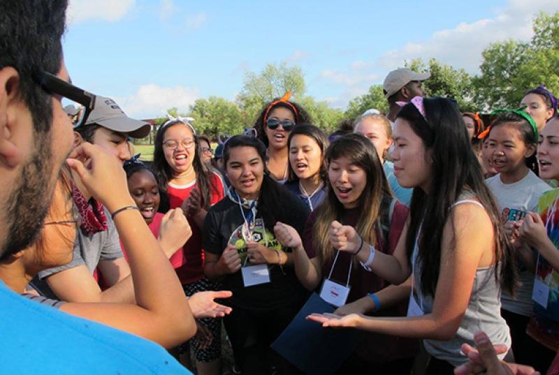 student in a huddle