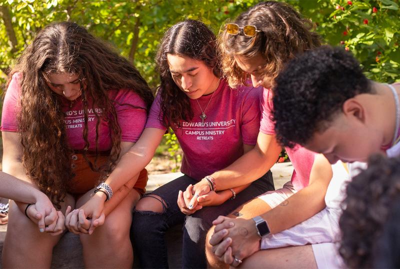 students praying