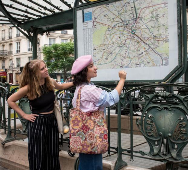 Art of Travel students reading street map in Paris