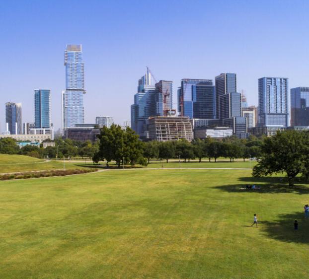 A photo of downtown Austin from Zilker Park