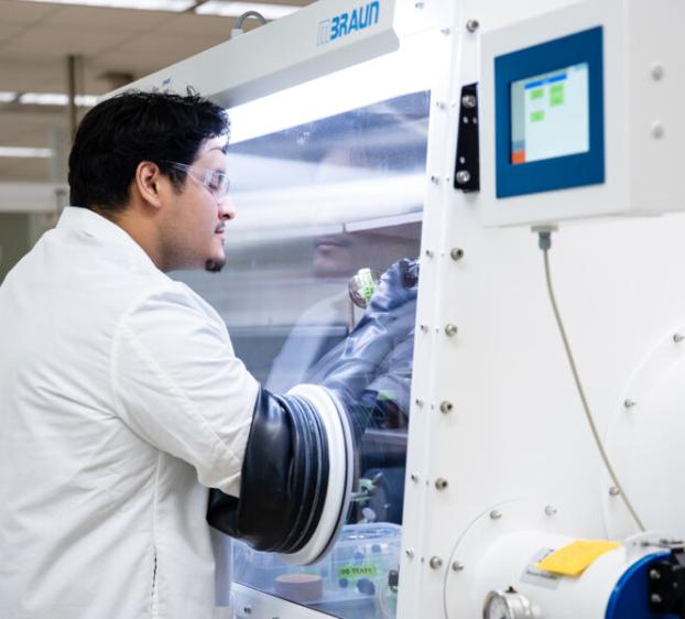 A St. Edward's student working in a high-tech lab on campus