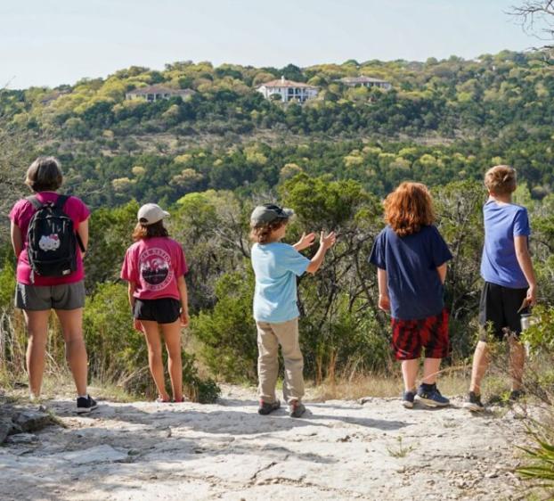 A tour group at Wild Basin Wilderness Preserve