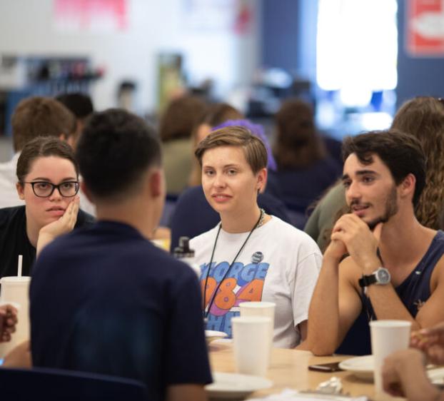 Students eating at the dining hall at St. Edward's University