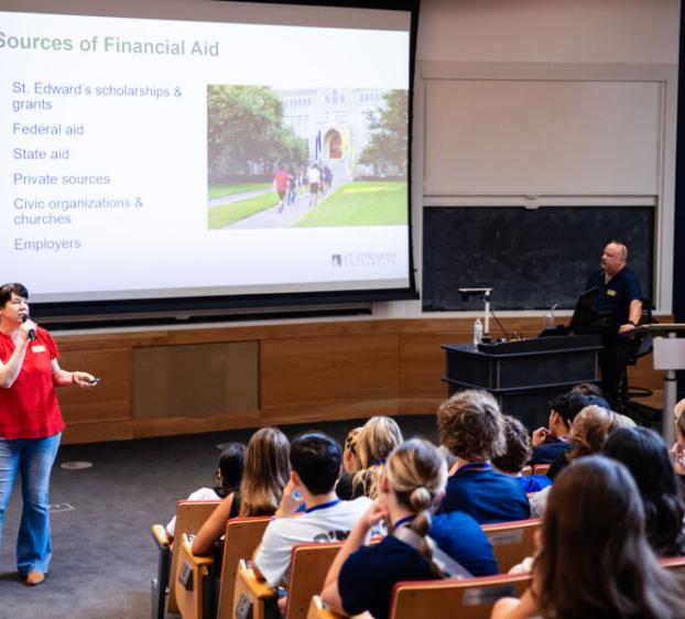 Senior Director of Student Financial Aid speaking to students on how to pay for college.