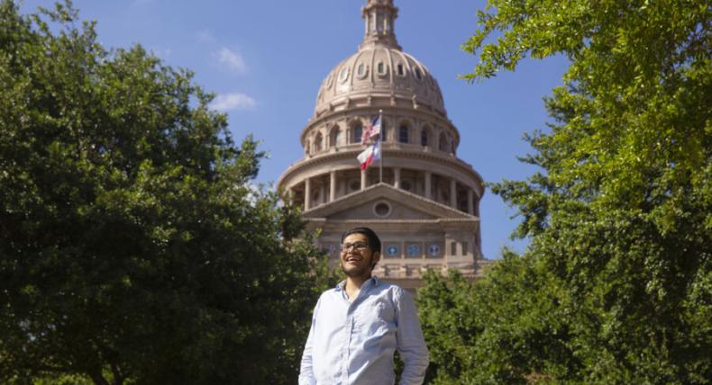 Skylar Garza stands outside of the Texas State Capitol.