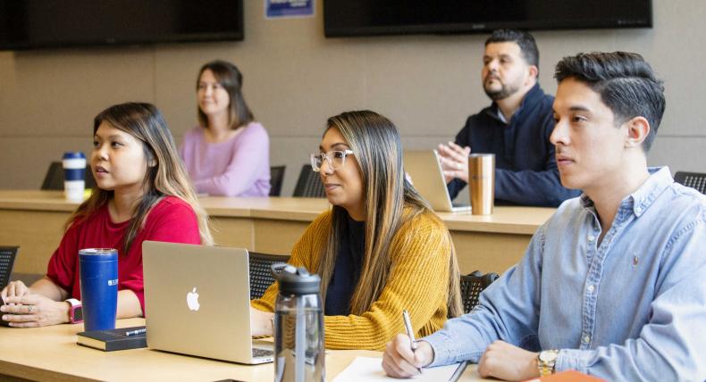 Grad students in a classroom 