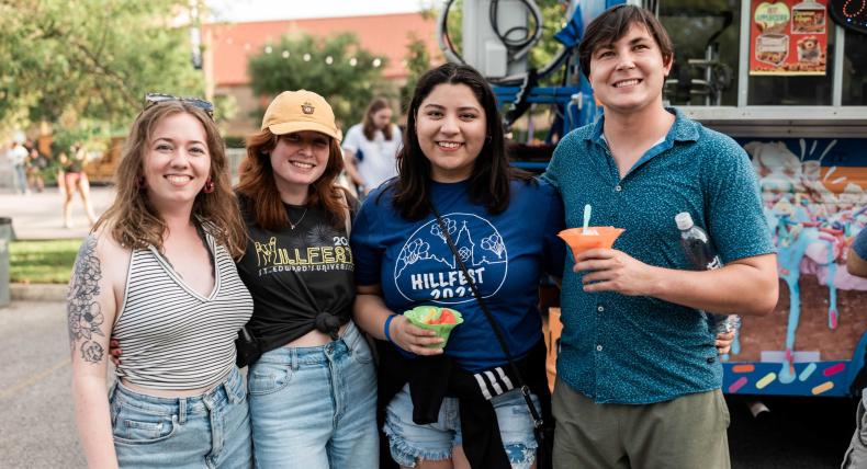 students enjoying a sno cone on campus 