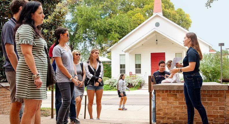 Students on a St. Edward's University campus tour