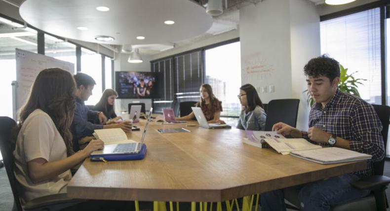 St. Edward's students meet in a conference room in the Capitol Factory.