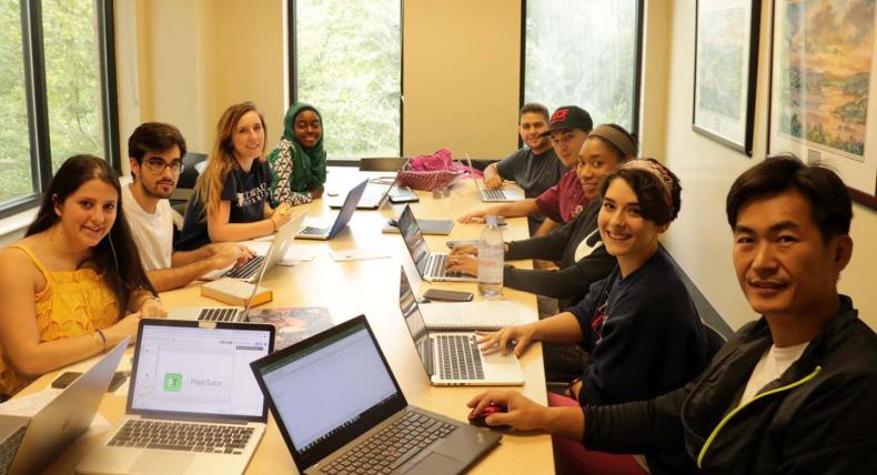 students working in conference room