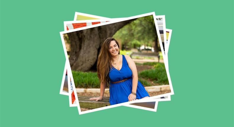 student in blue dress under a tree