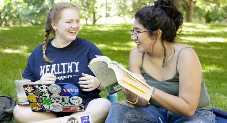 students talking outside