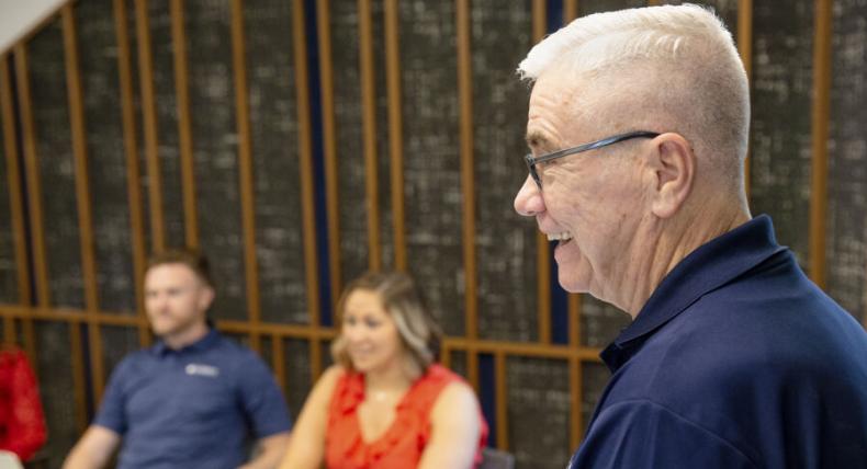 Program director Tom Sechrest instructs a class at St. Edward's University