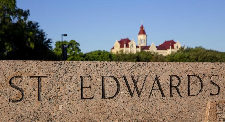 St. Edward's main entrance since with Main Building in the background.