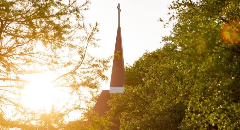 Photo of Our Lady Queen of Peace Chapel at dusk