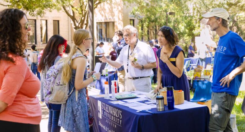 Amy Concilio talks with students about the School of Behavioral and Social Sciences