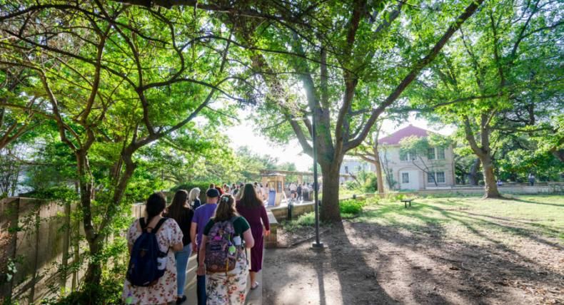 students walking on campus 