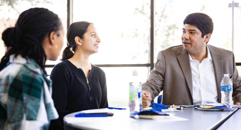 students talking during a conference