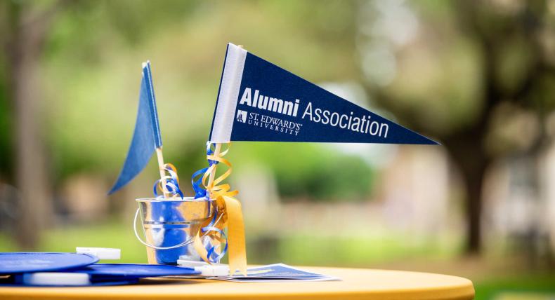  A pennant reads Alumni Association St. Edward's University.