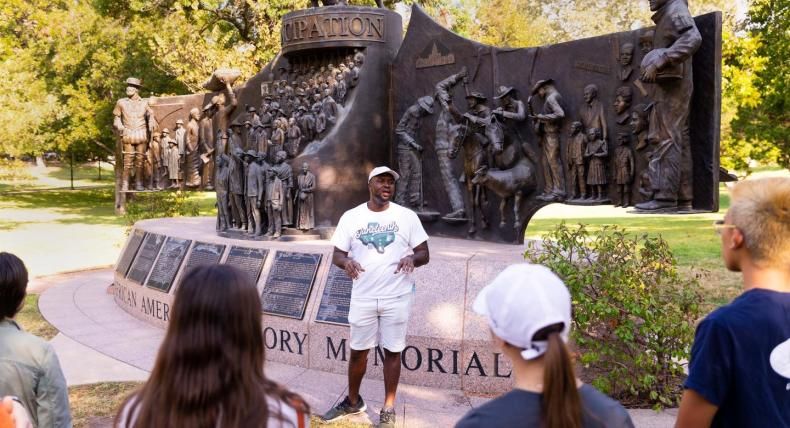 Javier Wallace leading the Black Austin Tour at the State Capitol