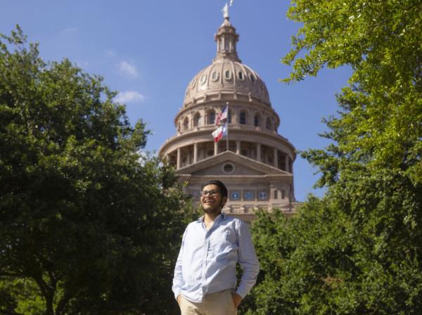 Skylar Garza stands outside of the Texas State Capitol.