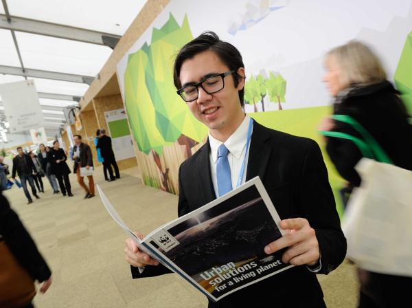 Chris Jackson reading a newspaper