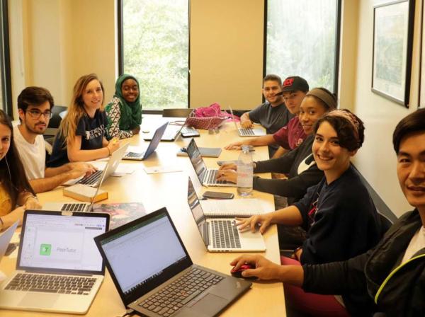 students working in conference room