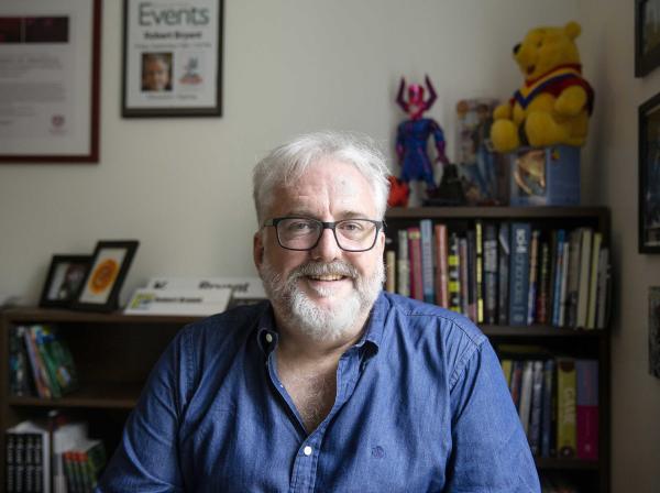 Robert Denton Bryant sits in his office.