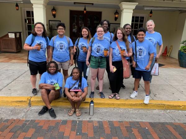 Sydney Mitchell, classmates and professor poses outside La Posada Hotel in Laredo, Texas, during their social justice journey.