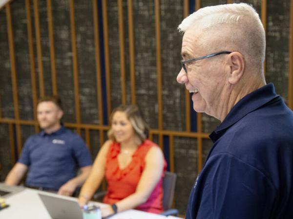 Program director Tom Sechrest instructs a class at St. Edward's University