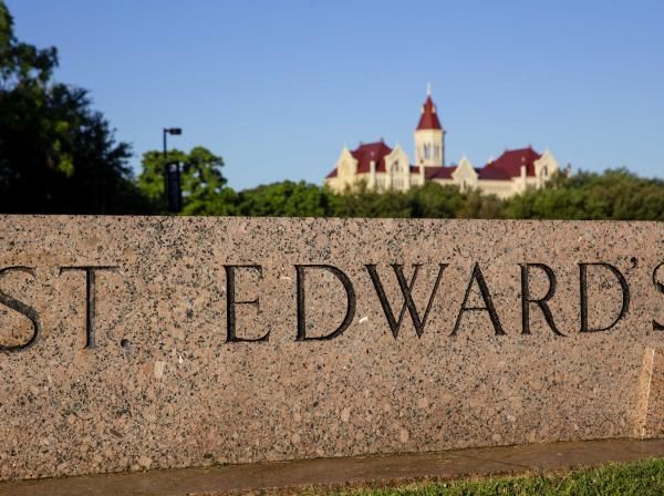 St. Edward's main entrance since with Main Building in the background.