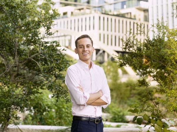 Finance major Christoph Hoermann ’21 poses for a photo in Austin's downtown business district.