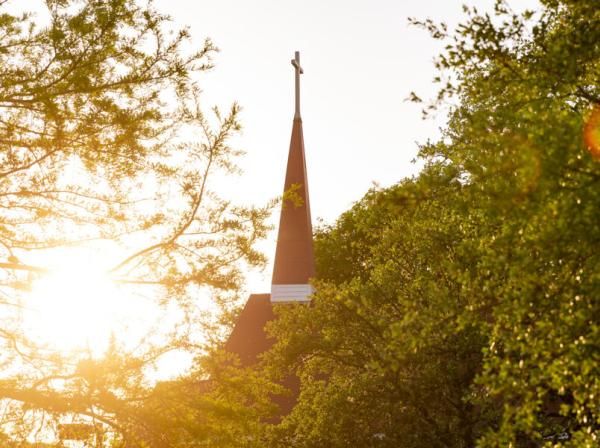 Photo of Our Lady Queen of Peace Chapel at dusk