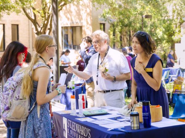 Amy Concilio talks with students about the School of Behavioral and Social Sciences