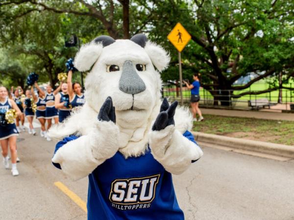 Topper the goat leading the homecoming parade